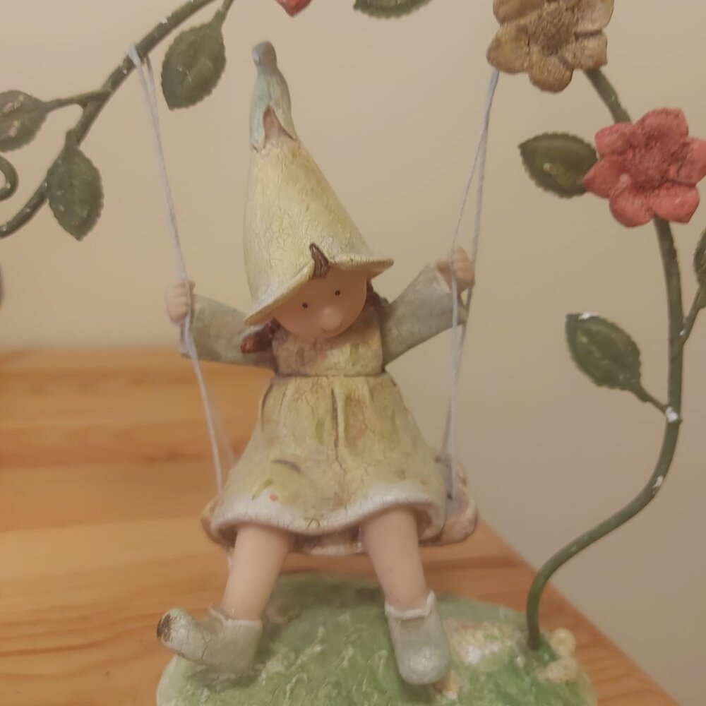 FIGURINE GIRL ON SWING